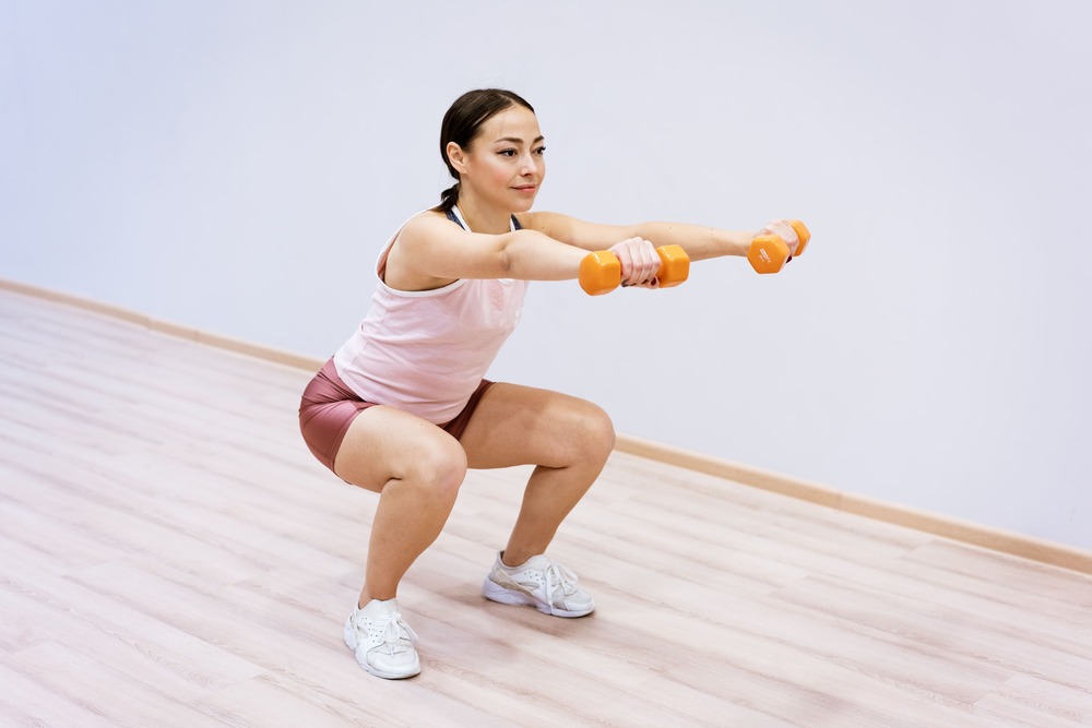 Động tác Weighted squats